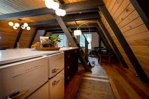 Moonshine Digs is the retro A-Frame of your dreams! Hot tub, record player, games, TVs and peace and quiet all nestled in the heart of the Cascade Mountains with Lake Cle Elum access. - Image 2