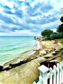 Lakeside Paradise! A charming blend of cozy comfort and beachfront bliss! - Image 3