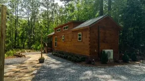 Secluded cozy tiny cabin on the water with fire pit and private dock - Image 5