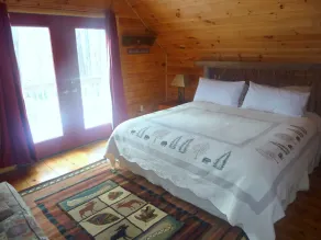 Tømmerhytte med privat udendørs boblebad - Image 4