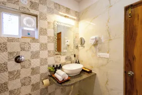 ELIVAAS Signature Mandovar Mountain Valley Retreat Pet-friendly Suite Room with Shared Pool, Garden, Restaurant & Hill Views - Image 4
