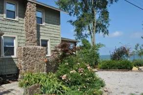 Enjoy the View From this Charming Lakefront House in Private Park - Image 5