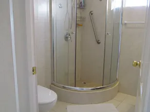 2 min walk to beach, buses, taxis, near stores, Oistins, The Gap.  A/C and Wi-F - Image 2