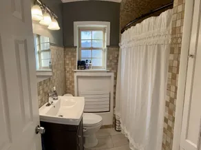 Walk to the Waves: Tudor Living Blocks from the Lake & Zoo - Image 2