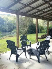 Secluded Riverfront Cabin Oasis - Image 2