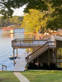 LAKE PERFECTION! Majestic views, A+ Location, TWO story dock. Pristine and comfy - Image 3