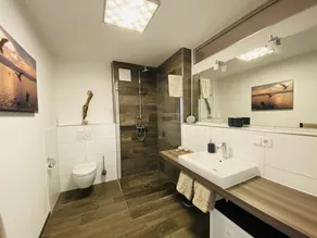 Pet-friendly & wheelchair-accessible—with a terrace where you can relax. - Image 2