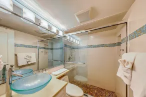 Island-themed living with furnished patio, shared pool & beach access - Image 3