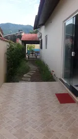 CASA COM PISCINA E AR CONDICIONADO CONDOMÍNIO MORADA DA PRAIA - Image 5
