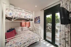 Two bedroom luxury condo with private patio with vineyard & BBQ near beach - Image 3