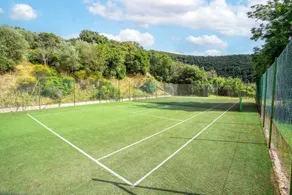 GuestHost - Comfortable apartment located in a historic Abbey from the year 1000, restored in 1980.La Badia is a small Benedictine Abbey immersed in a park of centuries-old olive trees.Located on the ground floor, there is a mezzanine for the sleeping ar - Image 2