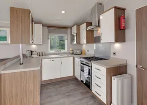 Spacious and luxurious 12ft-wide caravan with one double and two twin. - Image 5