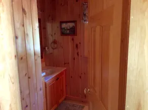 Quiet secluded log cabin; the cabin is part of a 37 acre waterfront complex. - Image 2