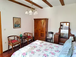 Lovely three-bedroom villa with a serene garden, offering privacy and comfort. - Image 5