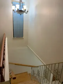 Cozy and cheerful 4-bedroom home with free parking on premises - Image 3