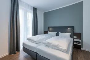 Top-ferienapartment mit Großer Terrasse, Parkplatz, Schwimmbad- & Saunanutzung - Image 5
