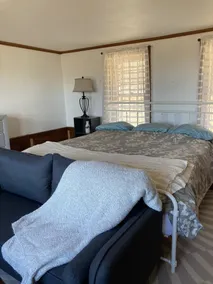 This cozy apartment is situated on 20 acres with a distant view of Sebago Lake. - Image 5