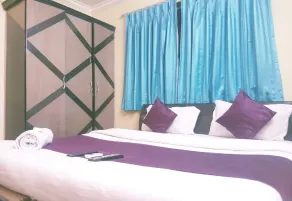 RG Suits & Apartment by OYO Rooms - Image 3