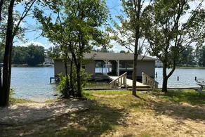 Relaxing lakeside retreat with boathouse, dock, deck, firepit and screened porch - Image 2