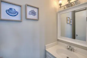 Experience oceanfront luxury at Happy Feet in Oak Island, with 4 bedrooms for 16 guests. - Image 3