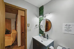 COZY CEDAR RETREAT  WITH HOT TUB // DECK // FIRE PIT- 5 MINUTES FROM LAKES!!! - Image 2