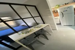 The building is right across from the beach, and the studio apartment has a wide view of it. - Image 4
