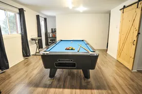 Modern Rustic Home with Wood Stove & Pool Table - Image 4