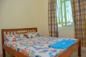 Private and gated villa in a peaceful and serene environment. - Image 5