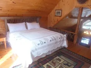 Tømmerhytte med privat udendørs boblebad - Image 3
