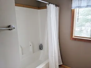 Room to gather inside and out with Rainy Lake access! - Image 5