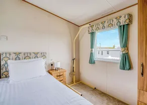 Comfortable spacious caravan with one double and one twin. - Image 3