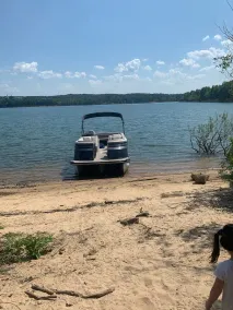 Beautiful lakefront home! Beach your boat, swim, kayak and more! Sleeps 2-10. - Image 4