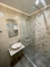 Chrysoula’s Welcoming Triple Room with Yard - Image 2