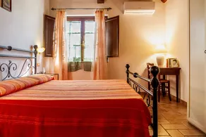 Appartement 'Villa Rosanna' avec terrasse privée, jardin privé et climatisation - Image 4