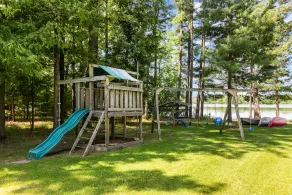 Family Friendly lake home, beach, level lot, fire pit, game room, dog friendly! - Image 2