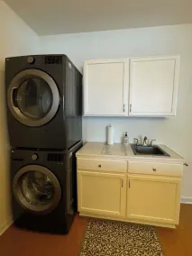 Spacious 4 BR 2BA Home with Bar and Fenced Yard - Image 3