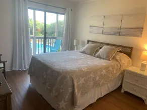 Ocean-side condominium with pool and private beach access - Image 5