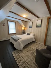 The Guides House • Cozy Main St Stay with Porch Views - Image 4