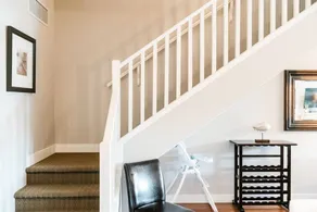 Poolside Barona Beach townhouse with lake views and private patio leading to the pool. Ideal for families/groups. Walk to the beach, enjoy the hot tub and resort amenities. Features a full kitchen, bunk room, king suite, and two living areas. - Image 2