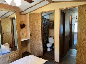 The Bears Den cabin w screened porch in campground on bike trail. - Image 5