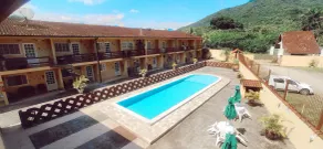 CHALÉ aconchegante c/ PISCINA. Região SUPER arborizada - Image 3