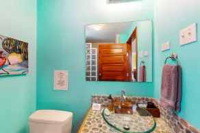 Vibrant, colorful lagoon-front suite with pool access, scenic patio, & W/D - Image 4