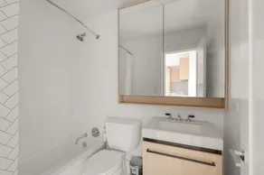 Bright Chelsea 1BR w/ Roofdeck, Doorman, BBQ, by Blueground - Image 2