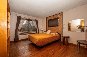 Thirty wooded acres, secluded, private five-acre lake, hot tub. - Image 4