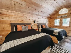 Cabin #1: Studio style layout with kitchenette and a large gravel parking pad beside the cabin for easy boat or trailer storage. - Image 3