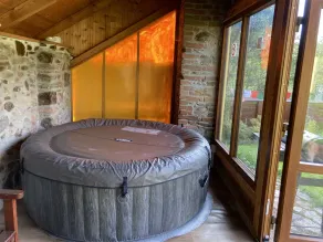 Renovated stone cottage on a forest meadow - Image 3