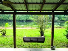 Secluded Riverfront Cabin Oasis - Image 3