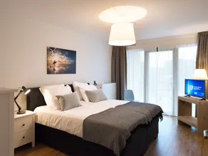 Modern apartment with a view of the Scheveningen harbor - Image 5