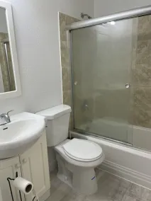 Modern home with free parking on premises - Image 4