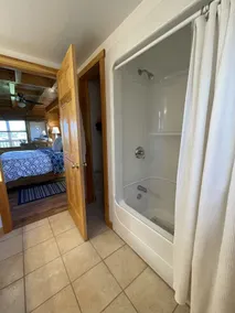Water Front Log Cottage With Access To Outdoor Community Pool - Image 5